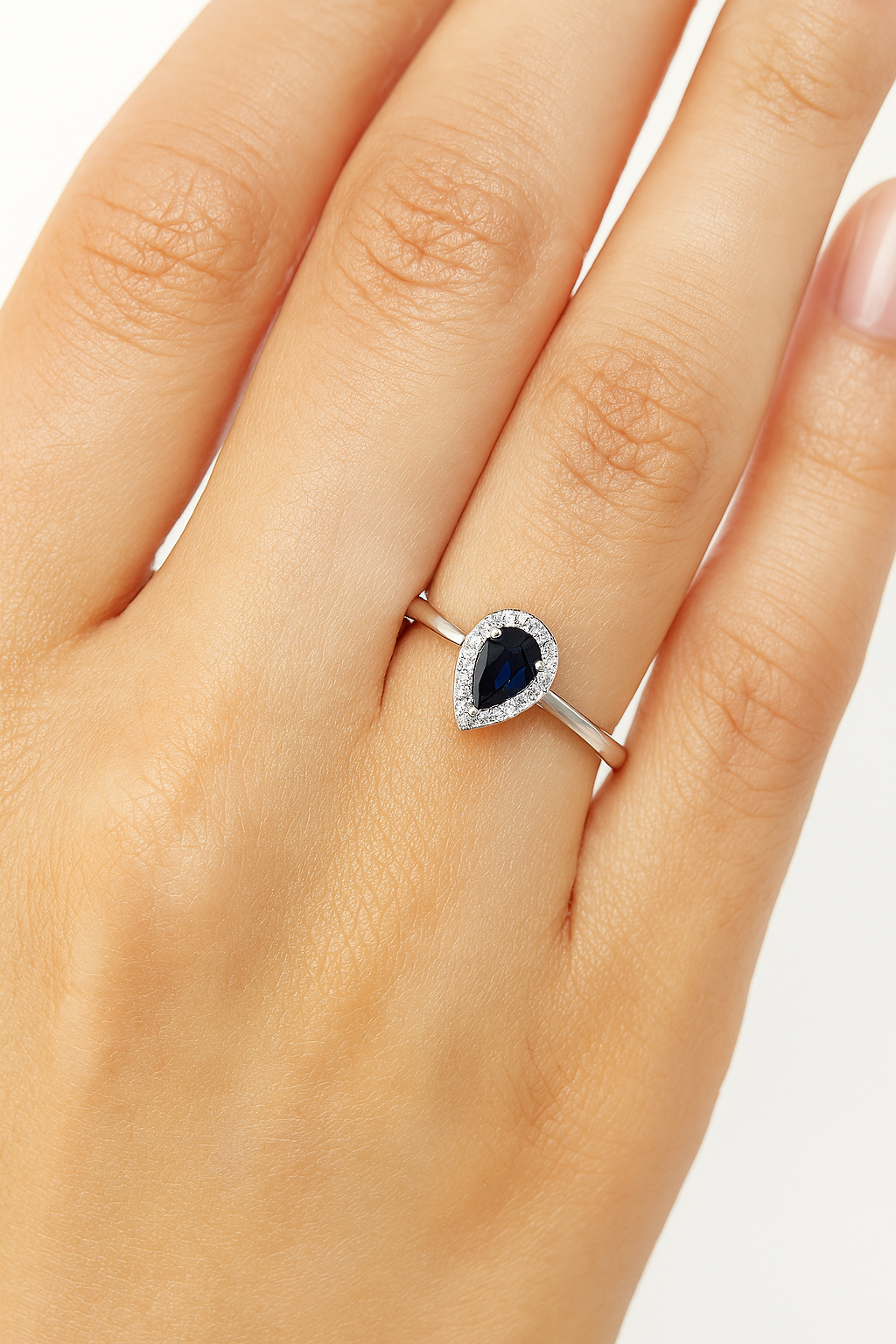 pear shaped blue sapphire and diamond ring